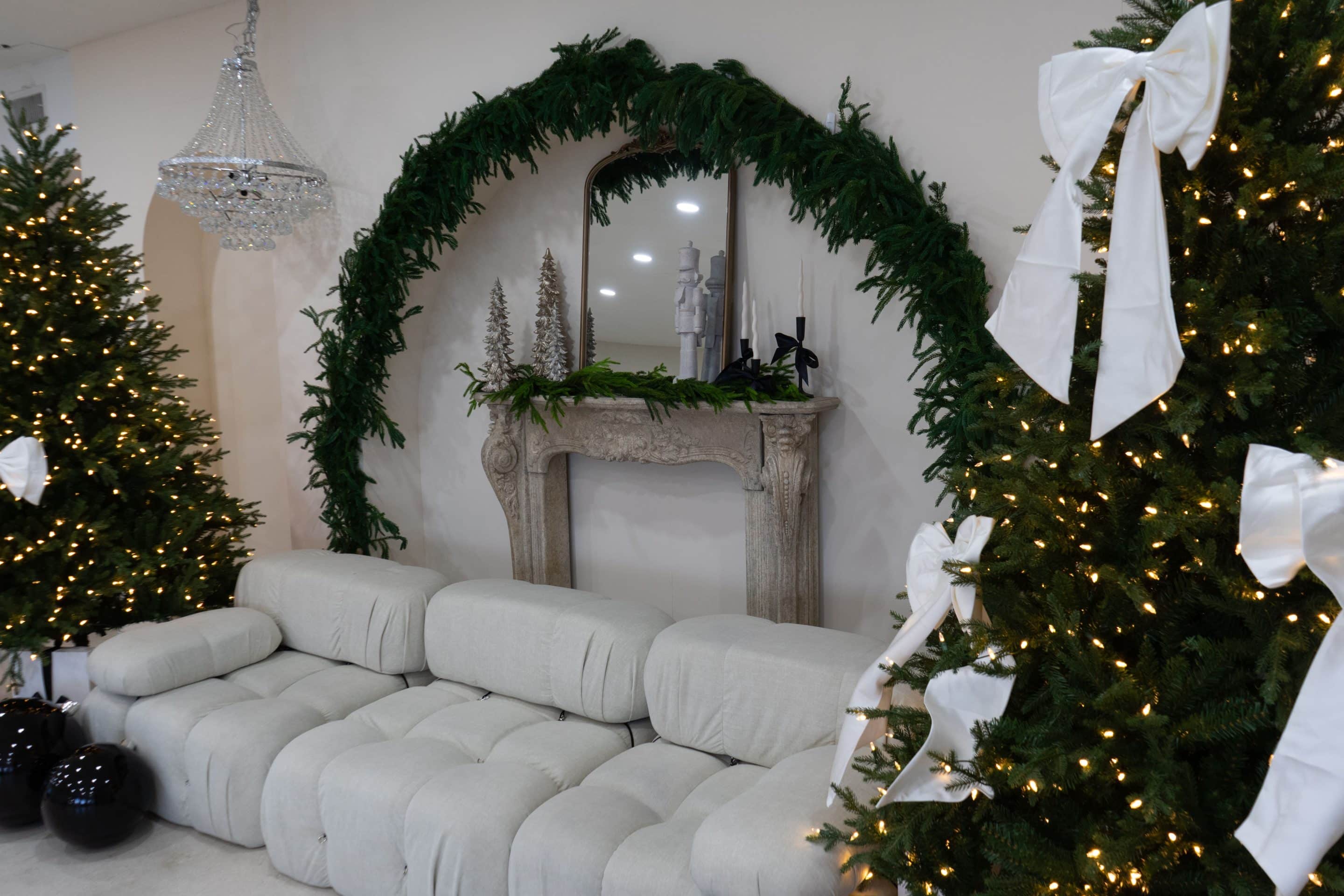 Natural light photography studio near Downtown Miami with signature arch set, seamless backdrops, and styled props